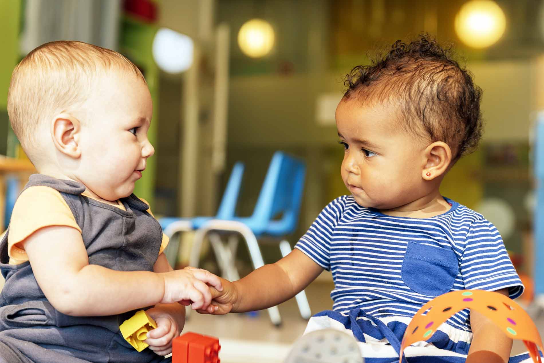Babies interacting during infant care at Deer Park daycare